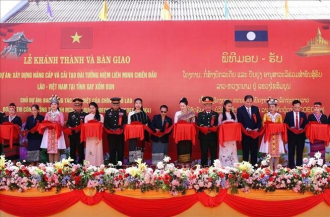 Vietnam-Laos solidarity spotlighted with monument handover
